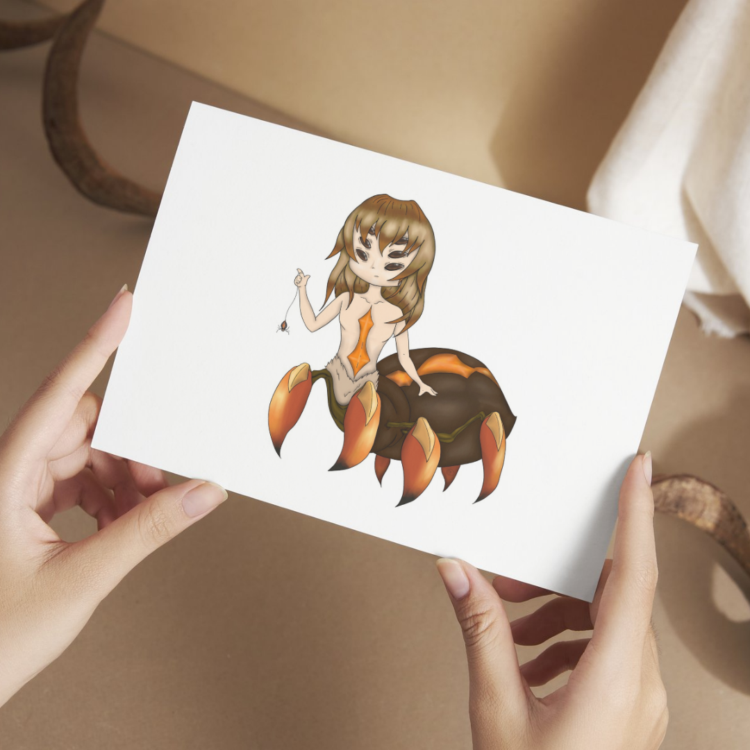 Person holding a card with a spider woman cartoon character 