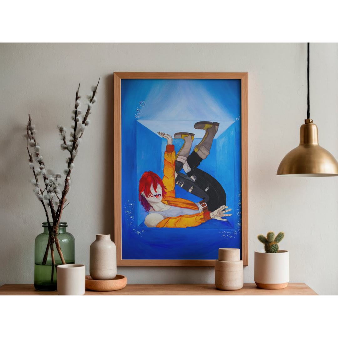 Framed artwork on a shelf with decorative items