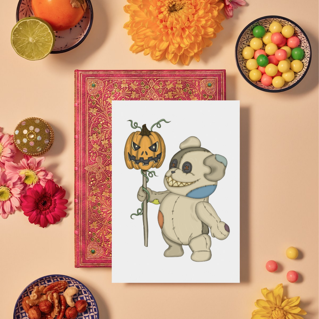 Card with a teddy bear holding a pumpkin on a decorative background with flowers and candies.