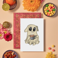 Card with a ghost holding a coffee cup surrounded by decorative items on a beige background