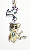Cat-shaped keychain with colorful design on a white background